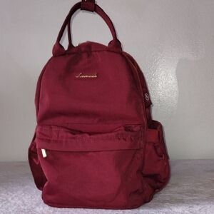 Elegant Burgundy Mini Bag with Versatile Design